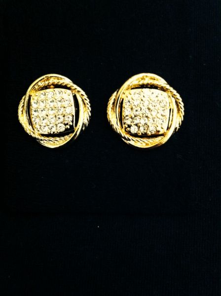 Brincos laços dourado